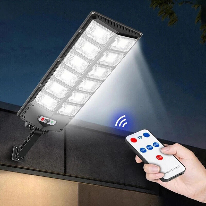 1 PCS Solar Street Light: 6500K 100000LM with 504 LEDs, Dusk to Dawn Solar Flood Light with Wide Angle Motion Sensor and Remote Control for Commercial and Yard Lighting