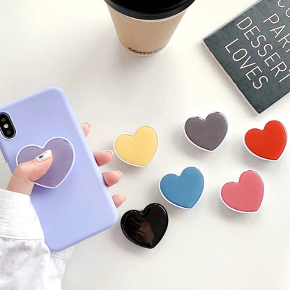 Universal Heart-Shaped Phone Socket Holder: Finger Grip Bracket Support for iPhone 15, 14, 13, Samsung - Pocket Socket Stand