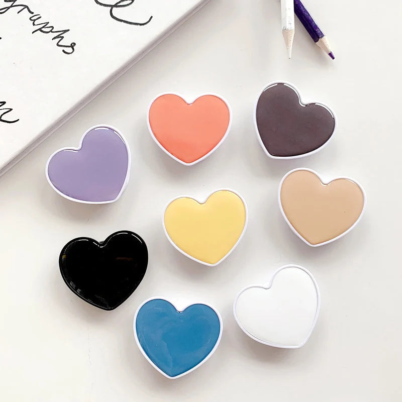 Universal Heart-Shaped Phone Socket Holder: Finger Grip Bracket Support for iPhone 15, 14, 13, Samsung - Pocket Socket Stand
