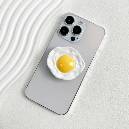 Creative Egg Phone Holder – Foldable Socket Grip & Expanding Stand for iPhone, Samsung, Mac, Magsafe
