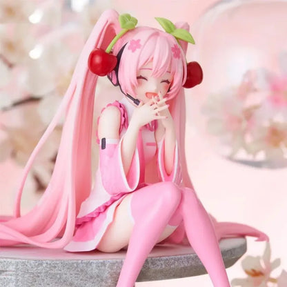 12cm Pink Hair Anime Figurine – Cute Sitting Pose TPR Model for Computer Case Decoration & Collectible Gifts