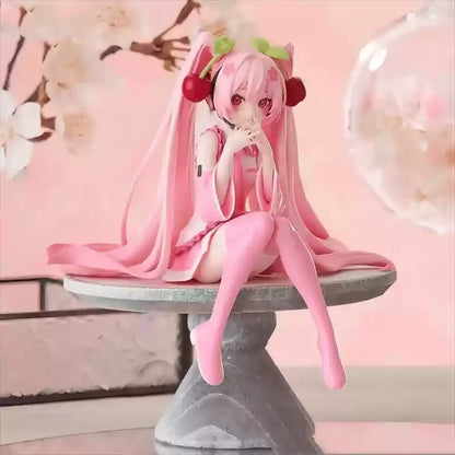 12cm Pink Hair Anime Figurine – Cute Sitting Pose TPR Model for Computer Case Decoration & Collectible Gifts