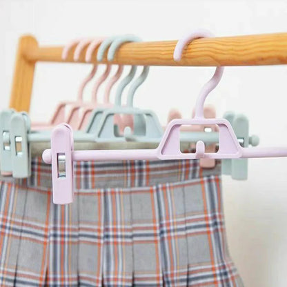 Space-Saving Chic: 5PCS Traceless Plastic Skirt Peg Hanger - Your Multifunctional Trouser Tamer!
