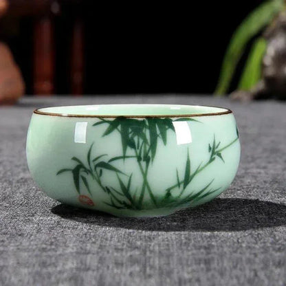 Traditional Celadon Hand-Painted Teacup — 80ml Ceramic Lotus & Bamboo Double-Fish Chinese Tea Cup