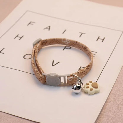 Pet Collar with Bell – Adjustable Cartoon Footprint Necklace for Dogs, Puppies & Kittens, Colorful Safety Bell Accessory